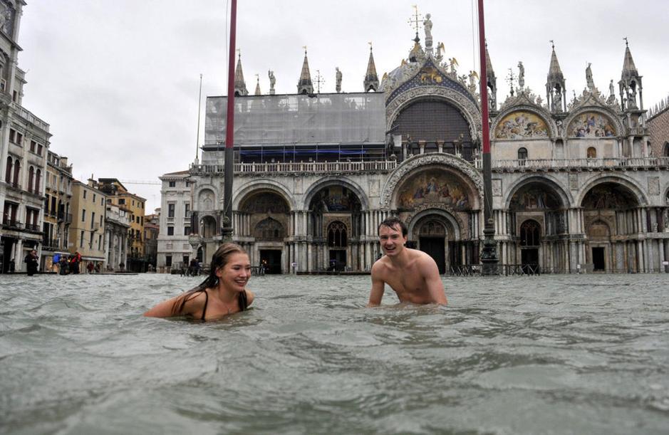 Swimming in Plazza San Marco of Venice when tide rises